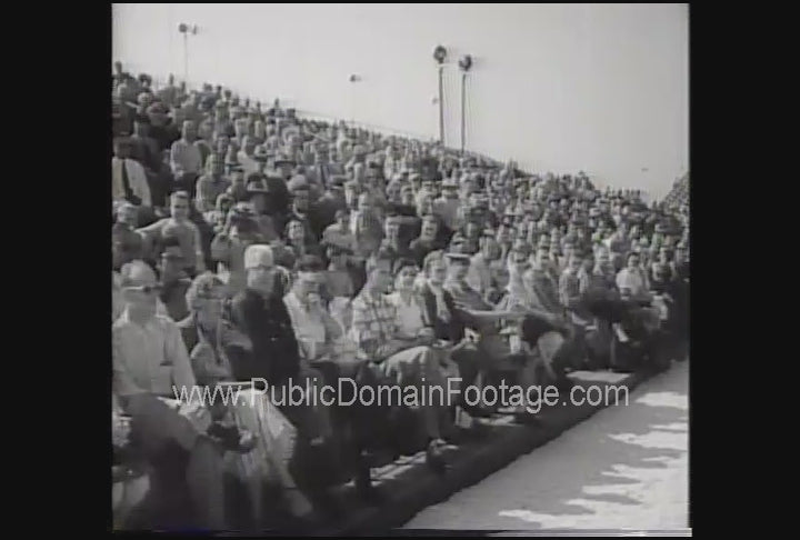 Female High Diver with large audience