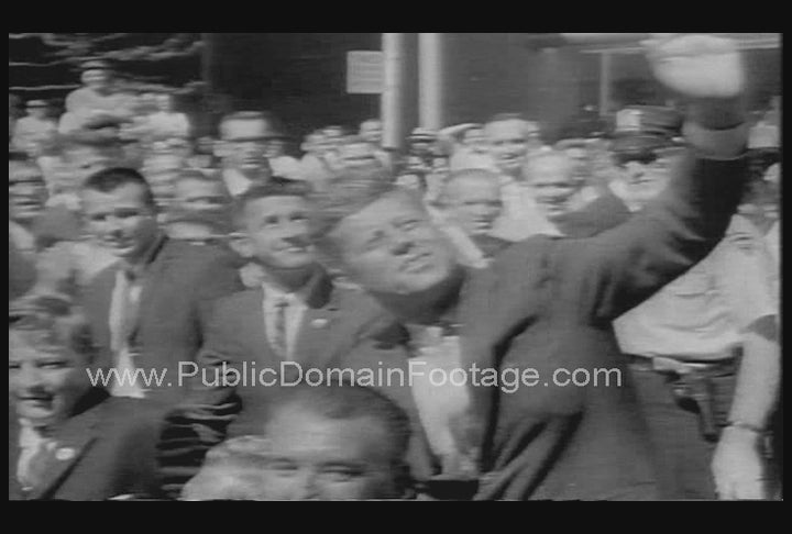 U.S. President JFK Waving from Car